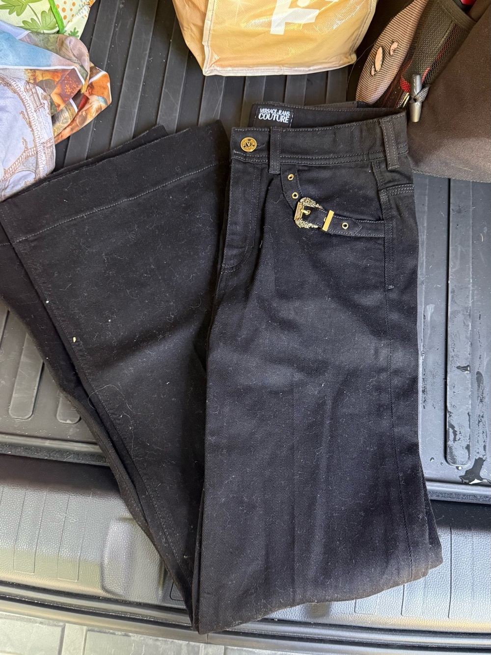 Versace Black Boot-Cut Jeans with Gold Buckle Accent